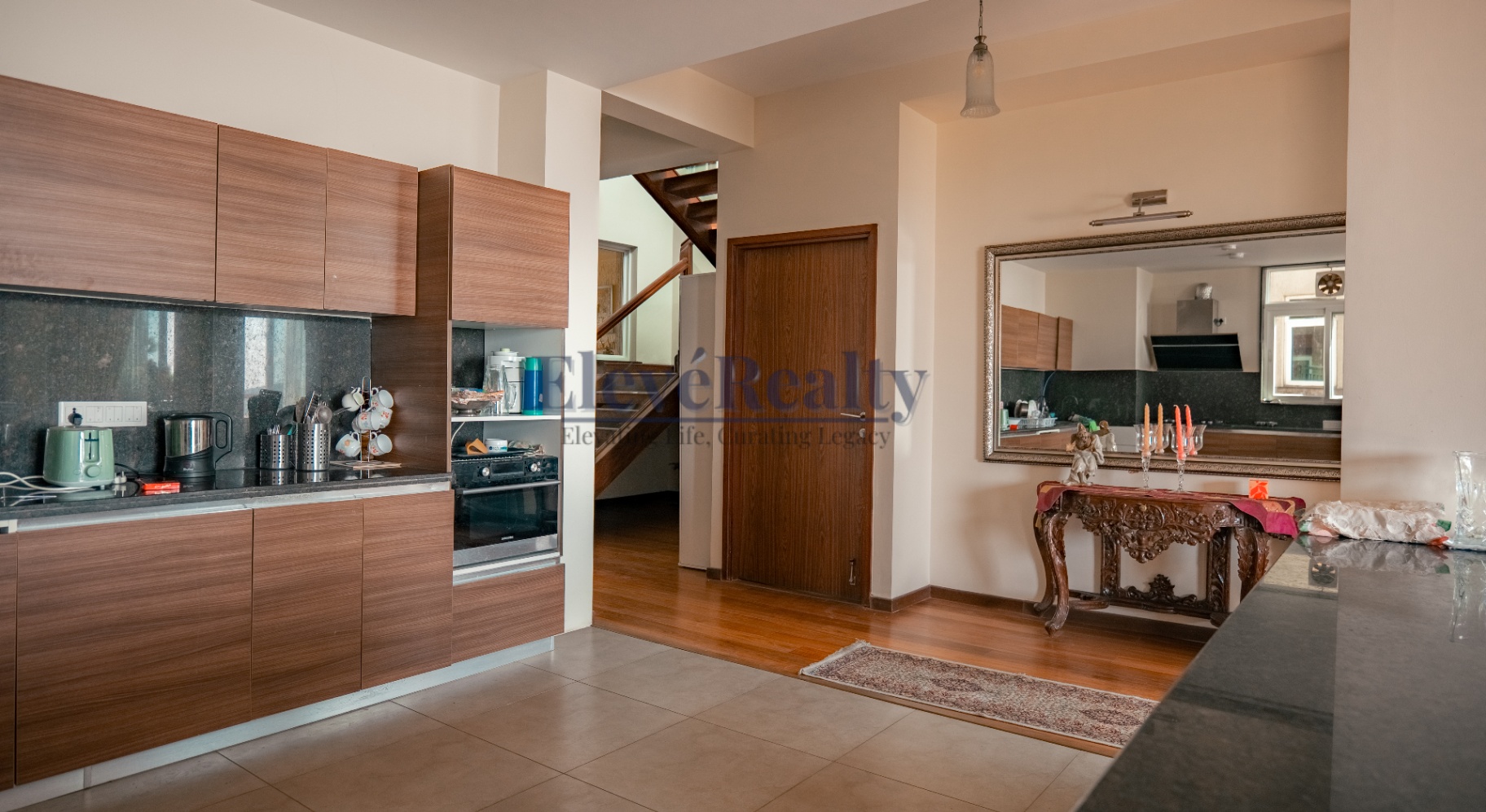 Kitchen and dining transition area with warm wood finishes